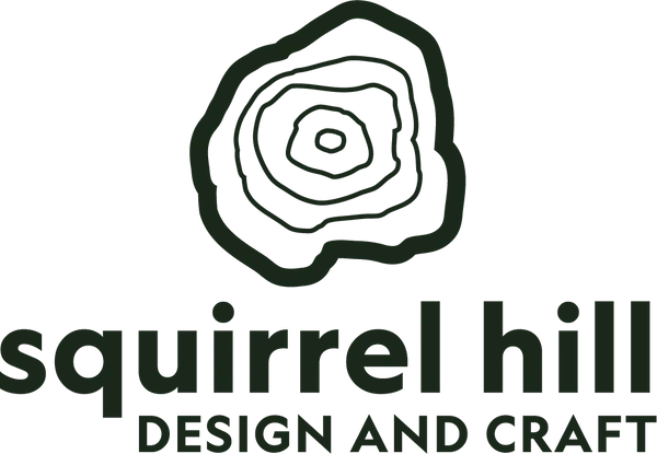 Squirrel Hill Design and Craft logo